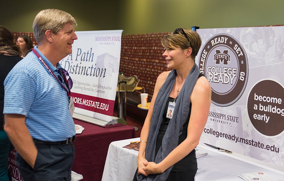 Picture of the MSU table at a college fair